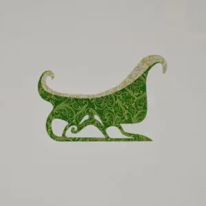 A green sleigh with white trim on the side.