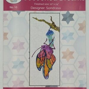 A cross stitch pattern of a butterfly hanging from a branch.