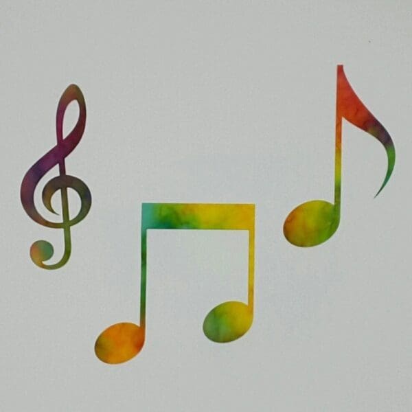 A rainbow colored musical note and treble clef.