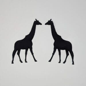 Red Rooster Laser Arts Silhouettes of two pre-fused, laser-cut giraffes from the Set of 2 Giraffes facing each other on a plain white background. These are laser cut and pre fused appliques, made from high quality quilting cotton.