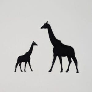 Red Rooster Laser Arts A precise laser-cut design of a mother and baby giraffe, pre-fused and facing each other on a plain white background. These are laser cut and pre fused appliques, made from high quality quilting cotton.