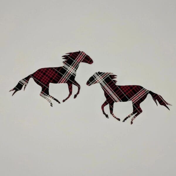 Two horses are flying in the air.