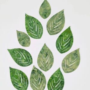 A group of green leaves that are arranged in the shape of a leaf.