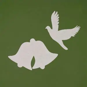 A white bird and two bells on a green background