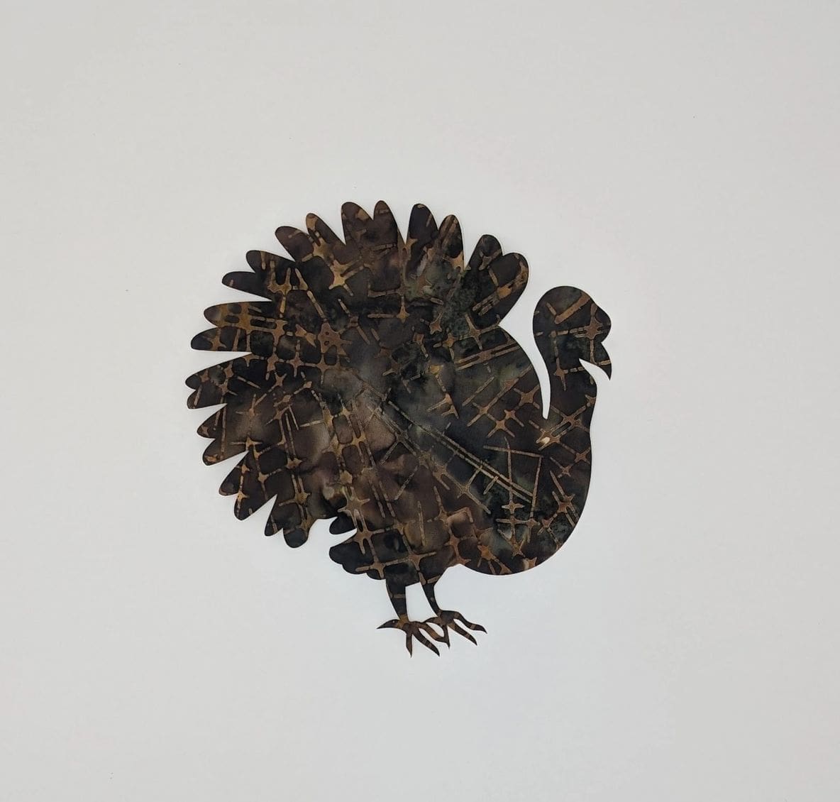 A turkey is standing on its hind legs.